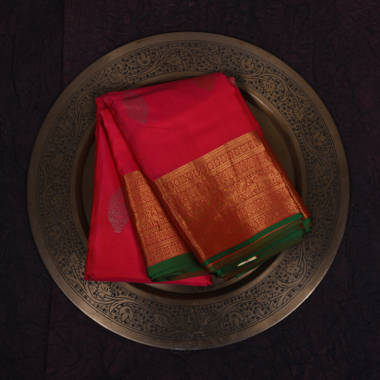 Red Kanjivaram Silk Saree with Gold Border and Green Accents