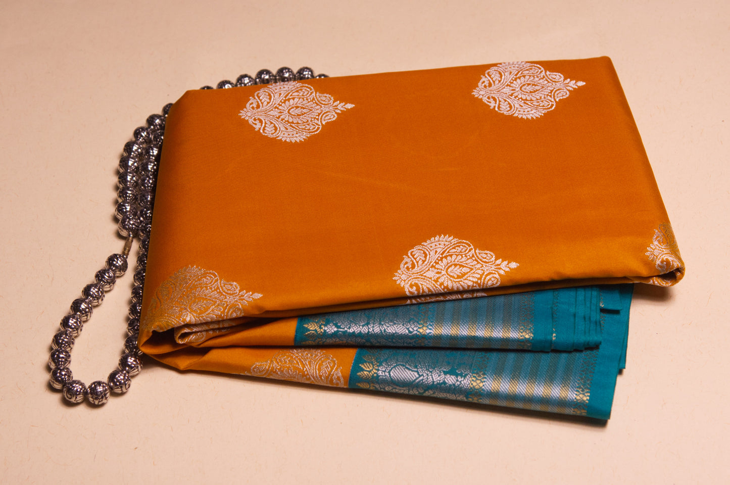 Sunset Orange and Teal Kanjivaram Semi Silk Saree