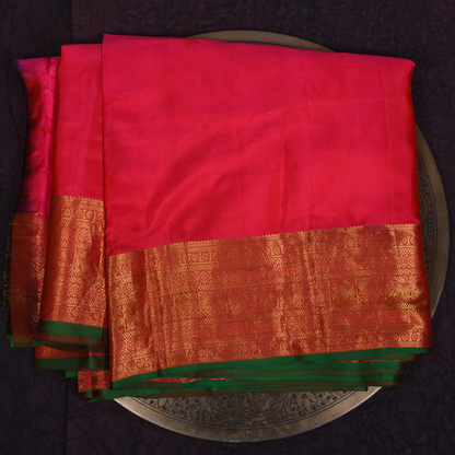 Red Kanjivaram Silk Saree with Gold Border and Green Accents