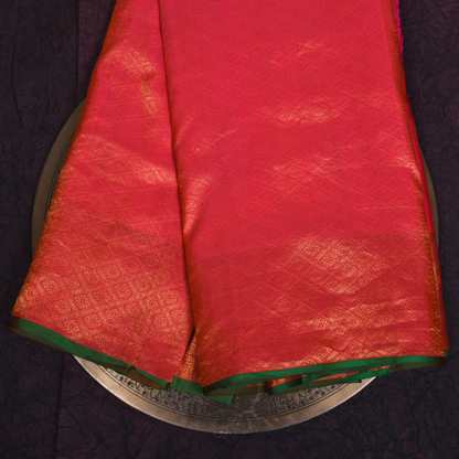 Red Kanjivaram Silk Saree with Gold Border and Green Accents
